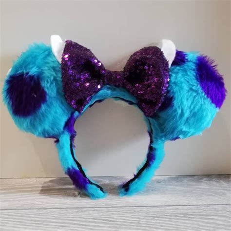 Sully ears - 7. Monsters inc - mouse ears headband. £20.00. 8. No bow Disney inspired headband Minnie Mickey Mouse ears for boys pixar cars - lightning McQueen matter monsters inc stitch and first trip. £8.49. 9. LUXURY Best Monster Friends Ears. £35.00.